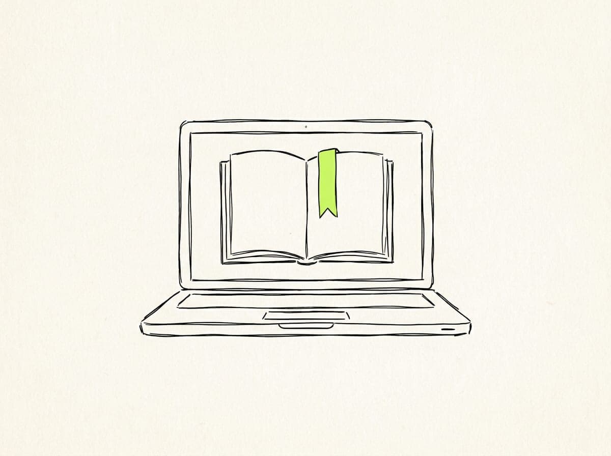 A laptop showing an open blank book